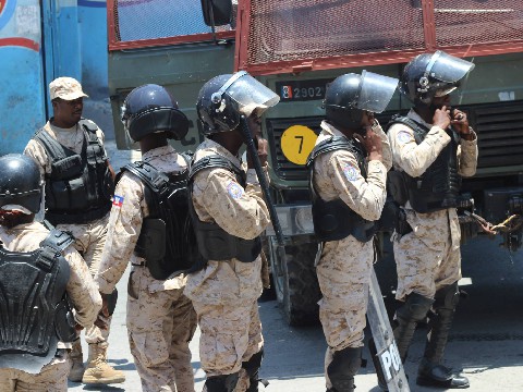 Heavily Armed Military police in riot gear