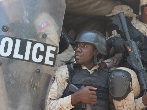 Heavily Armed Military police in riot gear